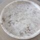 Small round tray in travertine