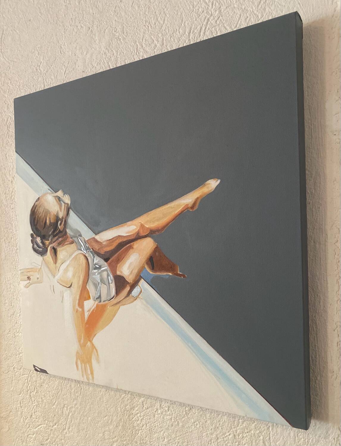 Seated woman painting