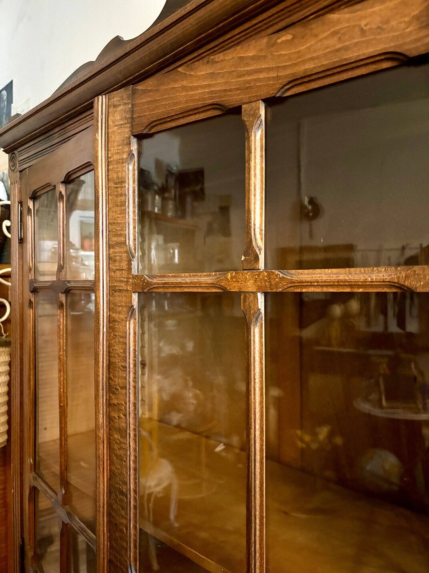 Dark wood dresser with 2 doors and 6 shelves