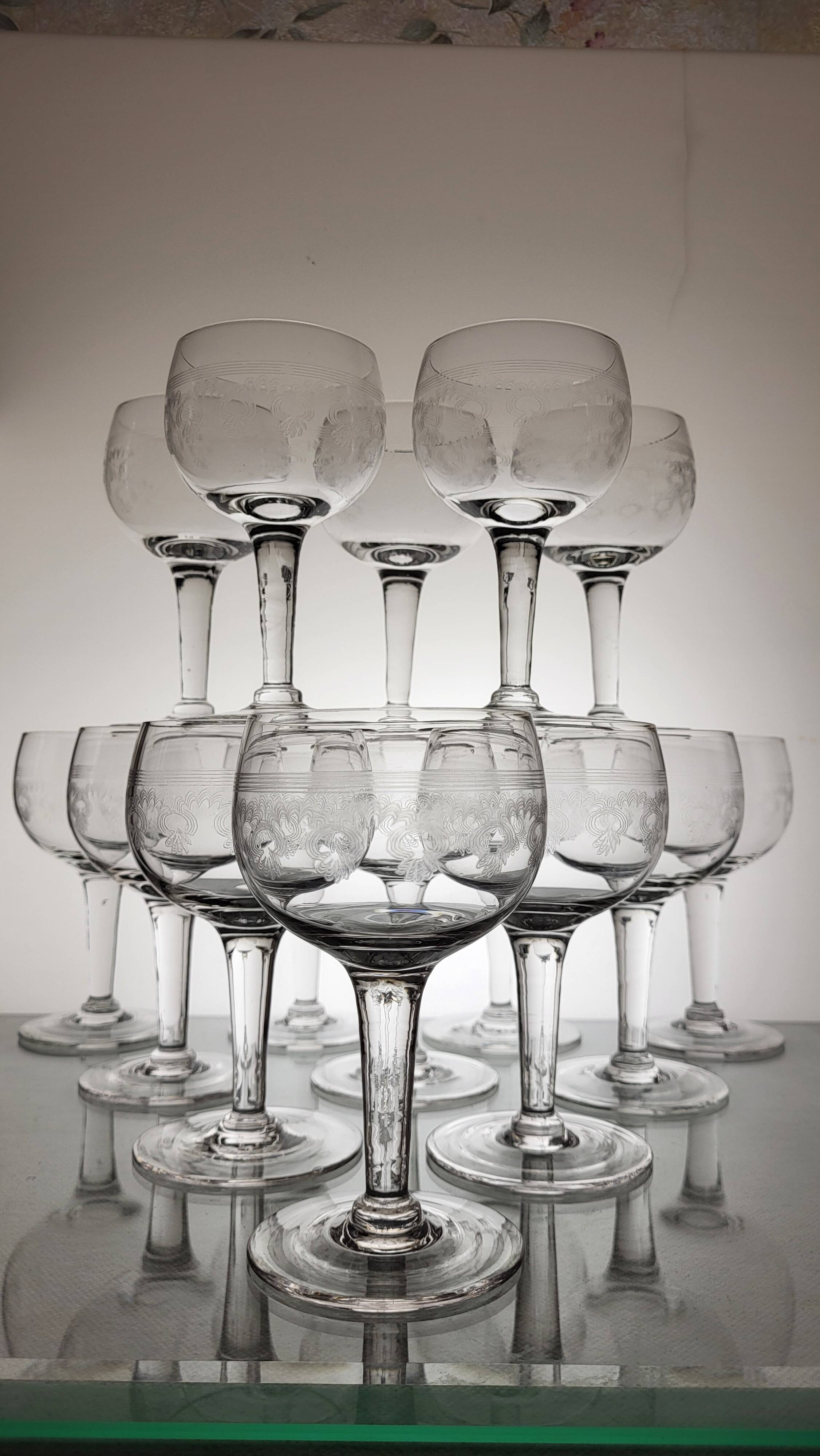 9 guilloche wine glasses, early 20th century