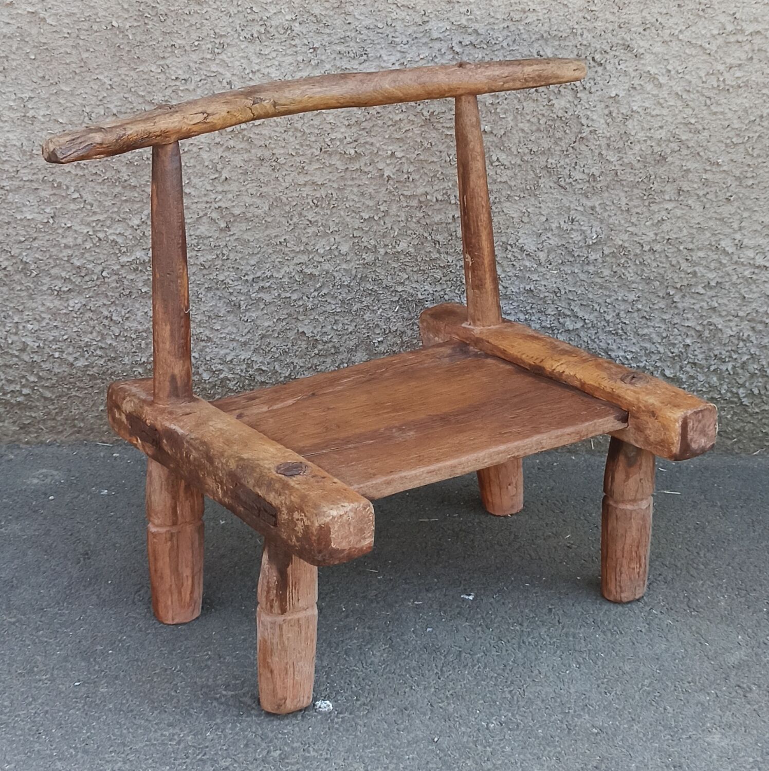 Antique wooden stool. Baoulé African art from Ivory Coast.