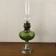 Antique oil lamp in glass and metal