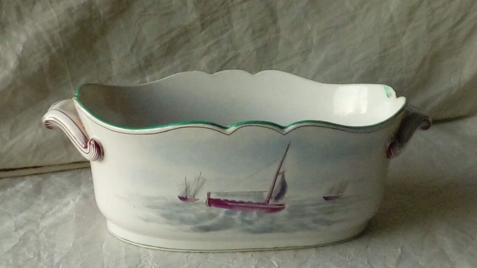 St Clement faience jardiniere with marine and swan decoration, early 20th century.