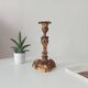 Antique 19th-century solid gilded bronze candlestick in the Louis XV style.