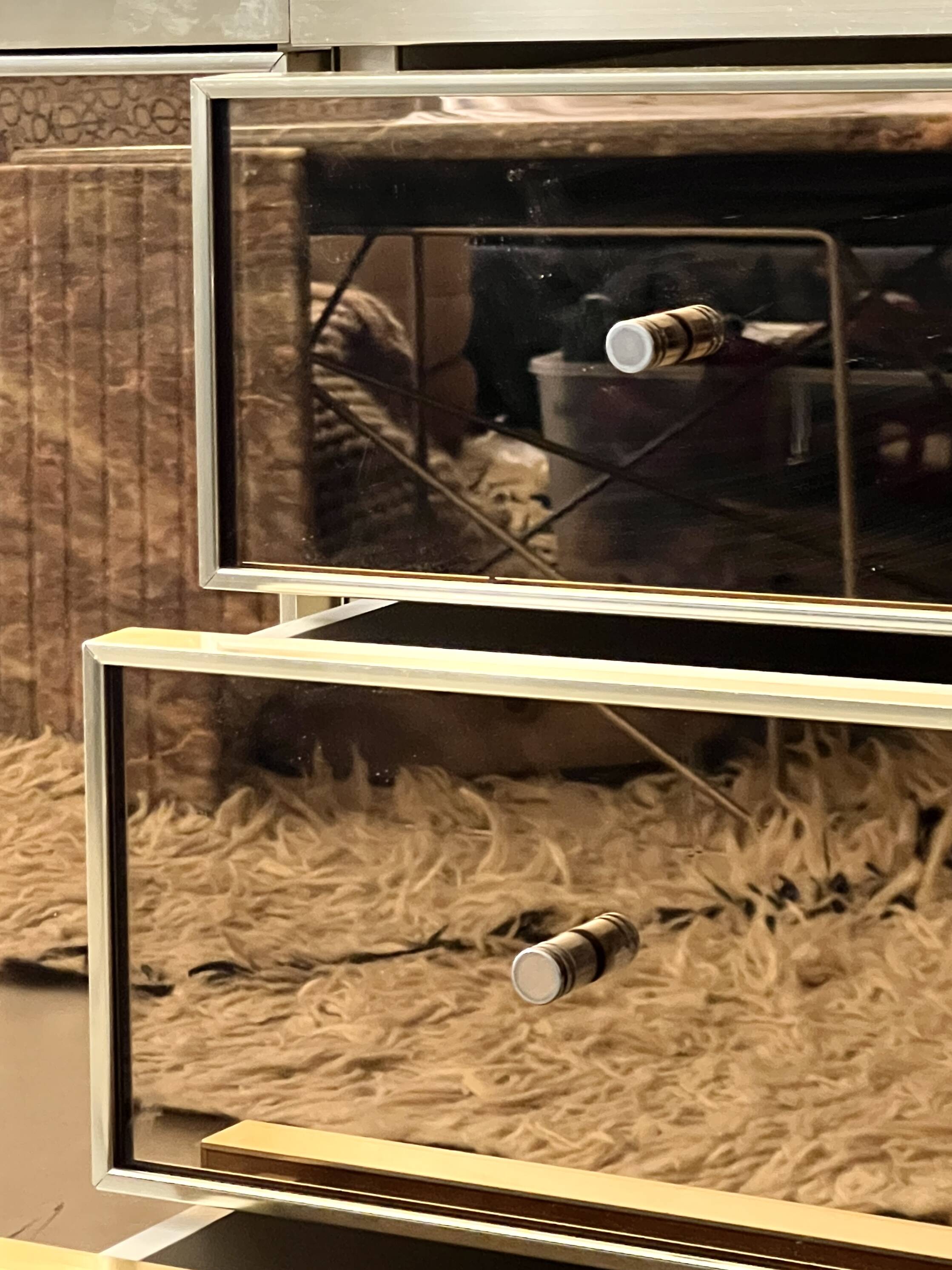 Ivory lacquered sideboard with polished finish and smoked mirror, JC Mahey design 1970.