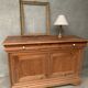 Honey-colored wood sideboard