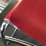 Chrome sled chair and red leather