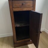Vintage bedside table in the shape of a wooden column and a gray marble top