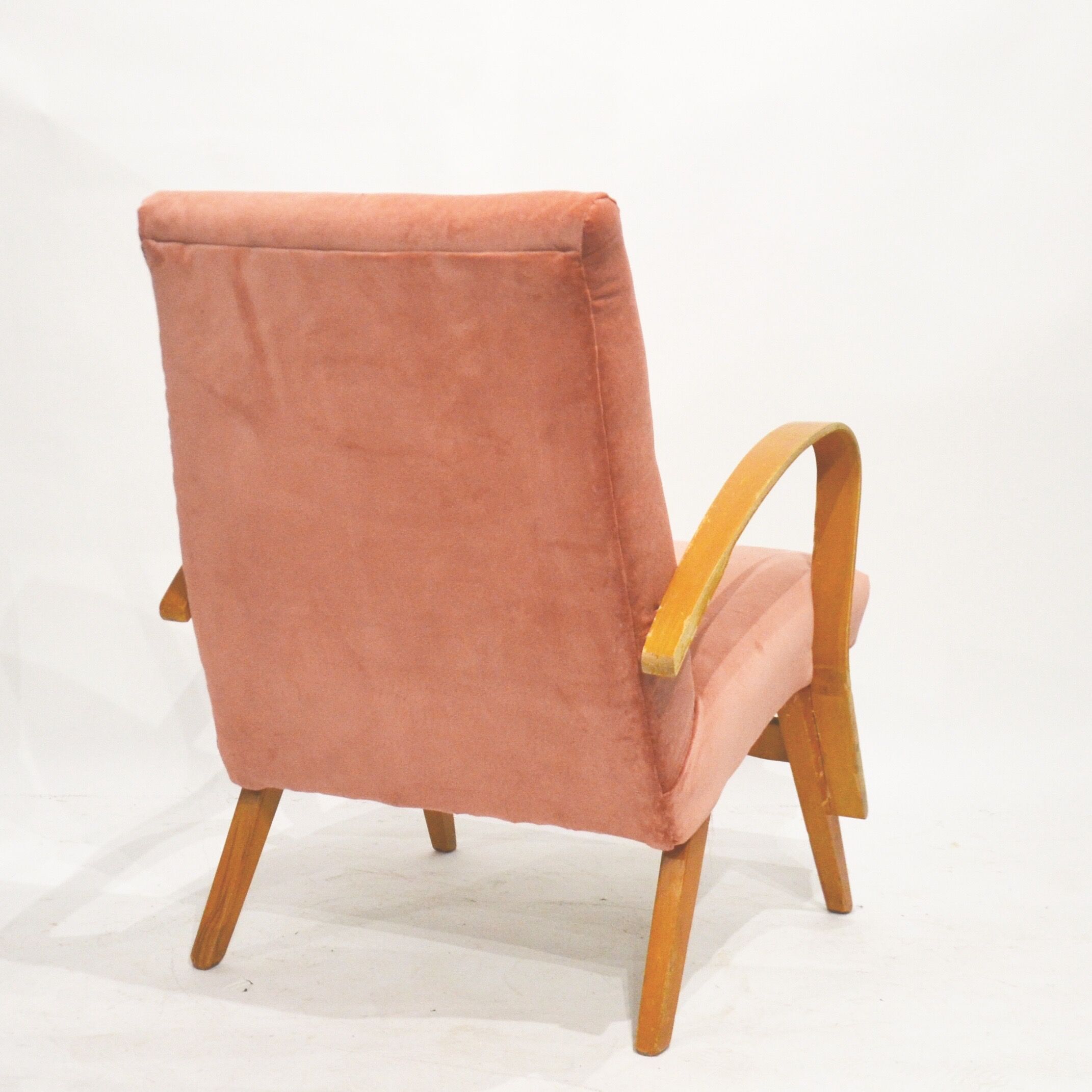 Peach velvet armchair