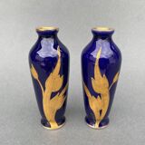 Pair of 1900 Limoges vases with blue background and gold highlights, R. Rosier decorations