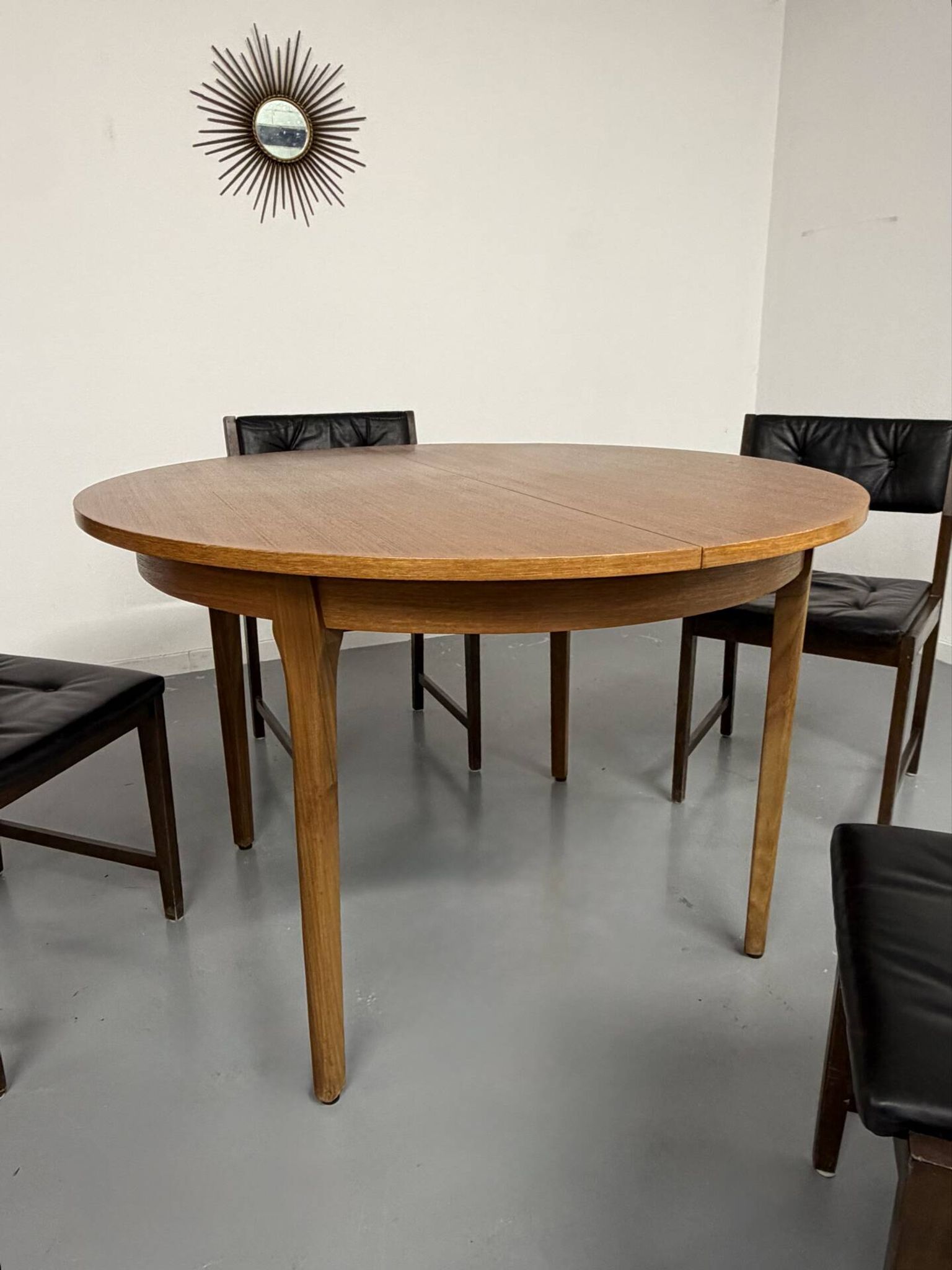 Vintage teak extendable round dining table Scandinavian design 1960s