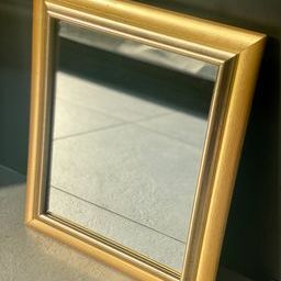 Wooden mirror, smooth and gilded