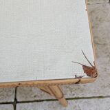 Petite table basse en rotin vintage