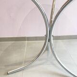 Chromed metal and smoked glass table