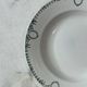 Set of 4 deep plates from Saint Amand with laurel wreath decoration.