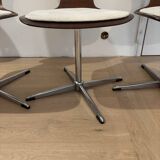 Lot of 4 vintage swivel chairs in the style of Arne Jacobsen.