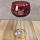 Antique fuchsia pink engraved glass – twisted stem