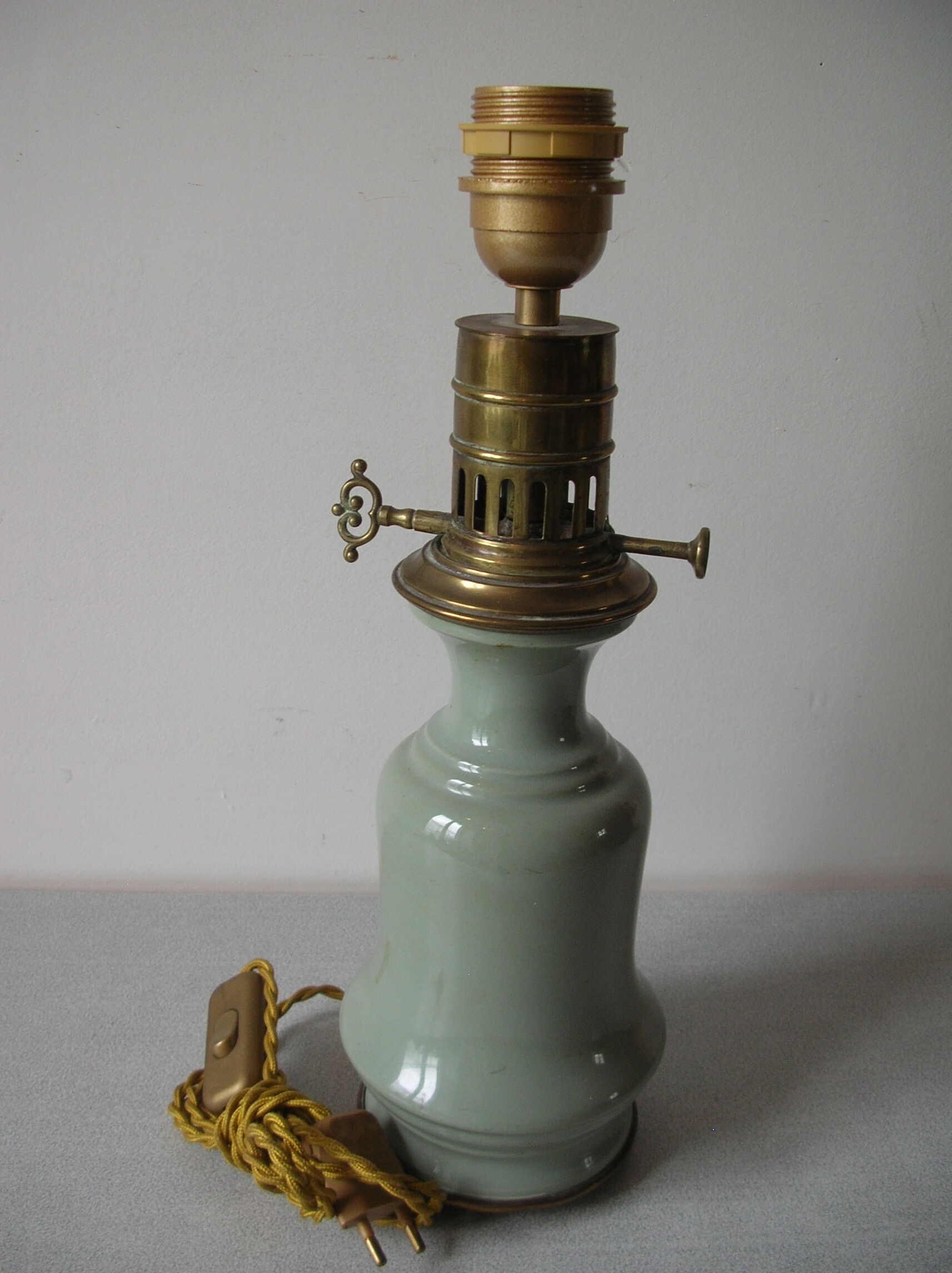 Old ceramic lamp foot and brass electric wire golden cord night light