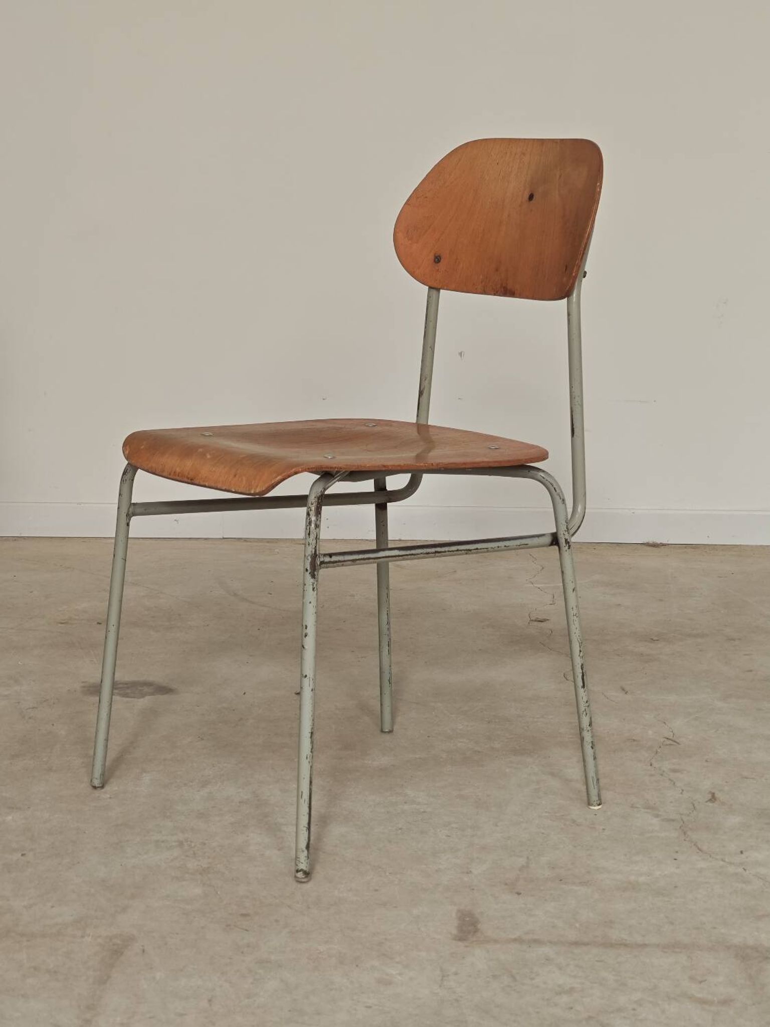 Set of 8 metal and wood school chairs  
Ex Czechoslovakia 1960
