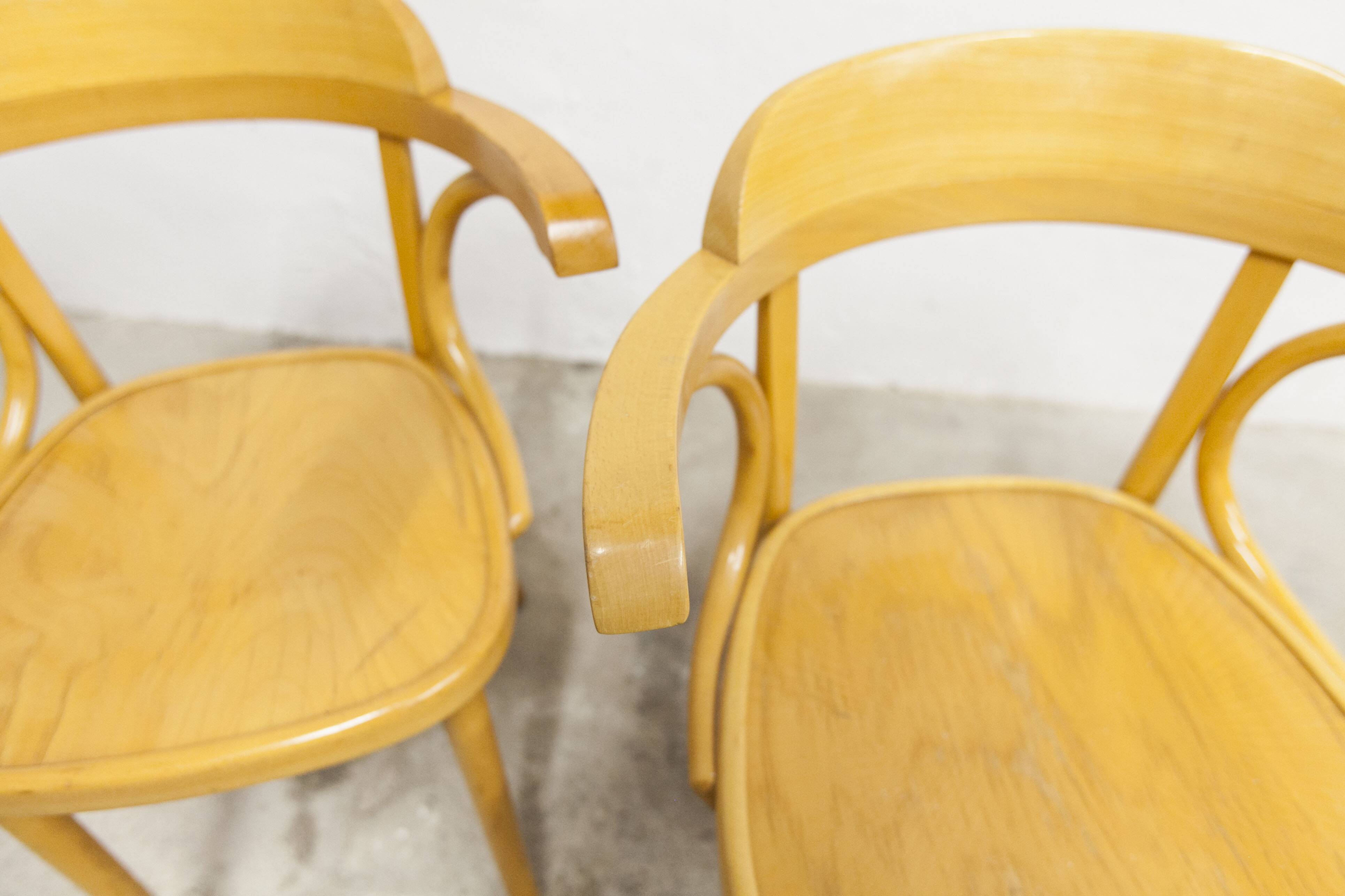 Set of 4 bistro armchairs with armrests from the 1960s.