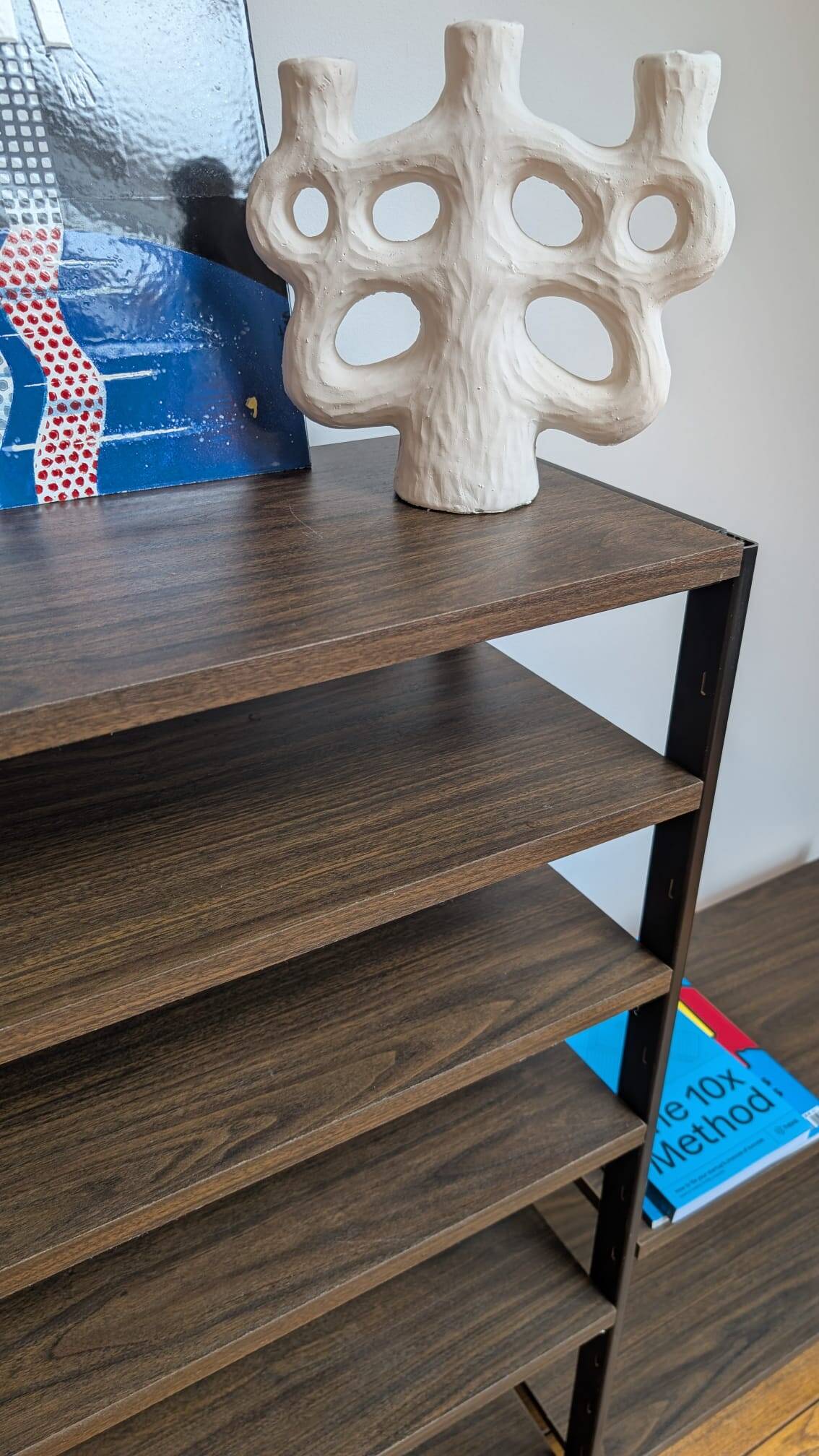 Modular rosewood bookcase by Pierre Guariche for Meurop