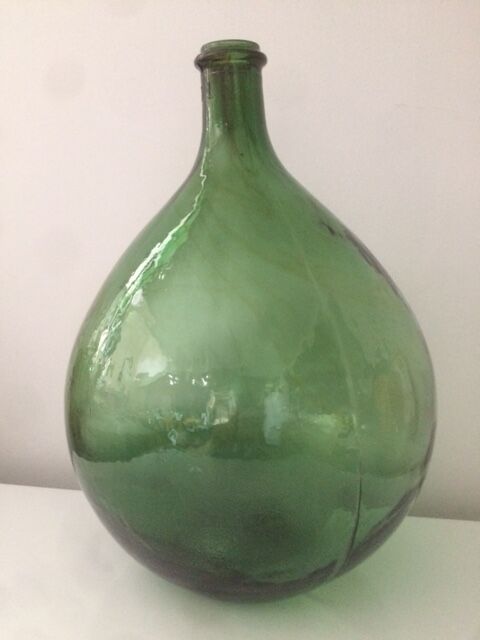 Demijohn with a beautiful glass mixing green and brown