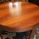 Louis XVI-style blond walnut half-moon console table