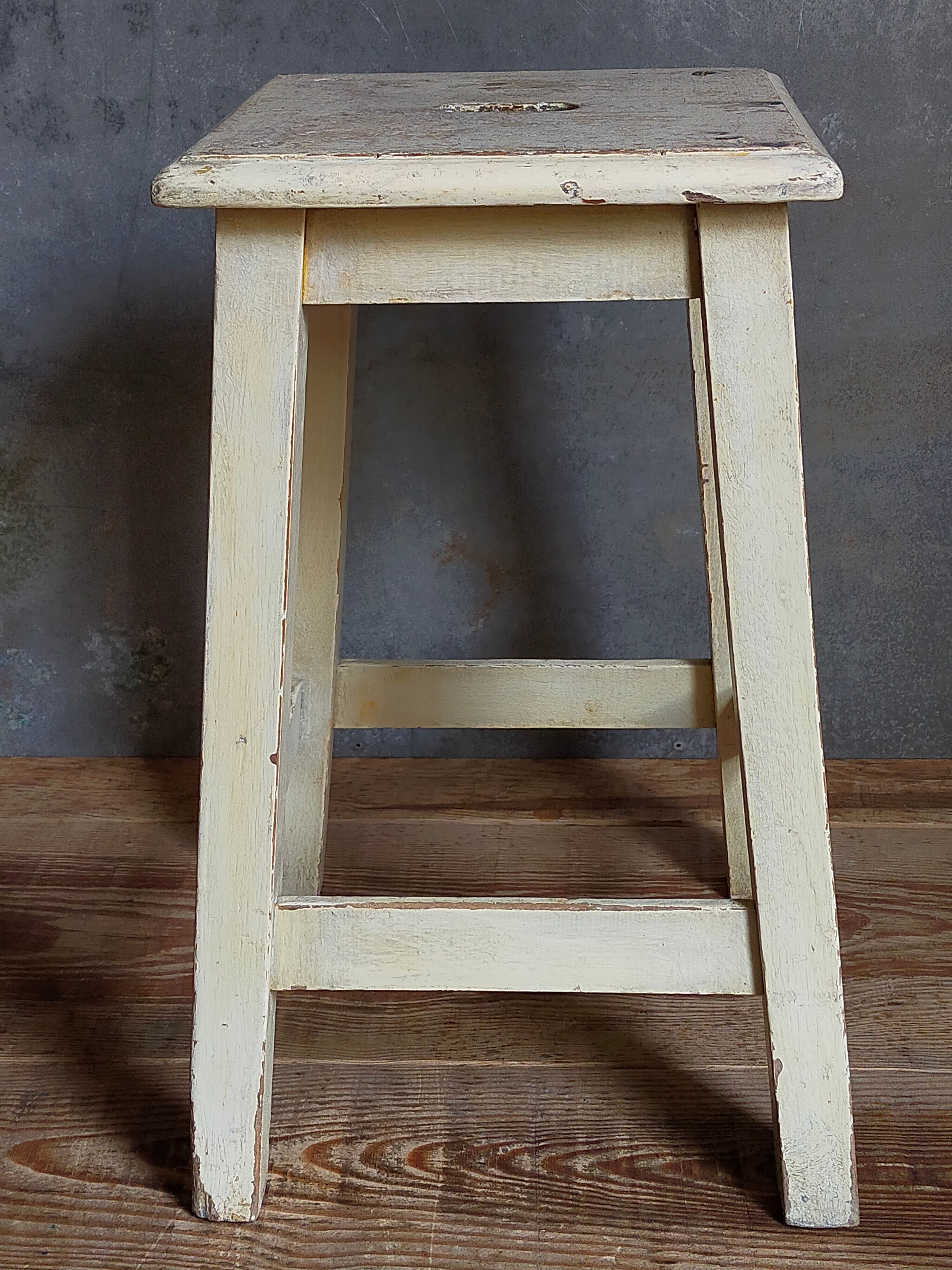Wooden workshop stool with old patina