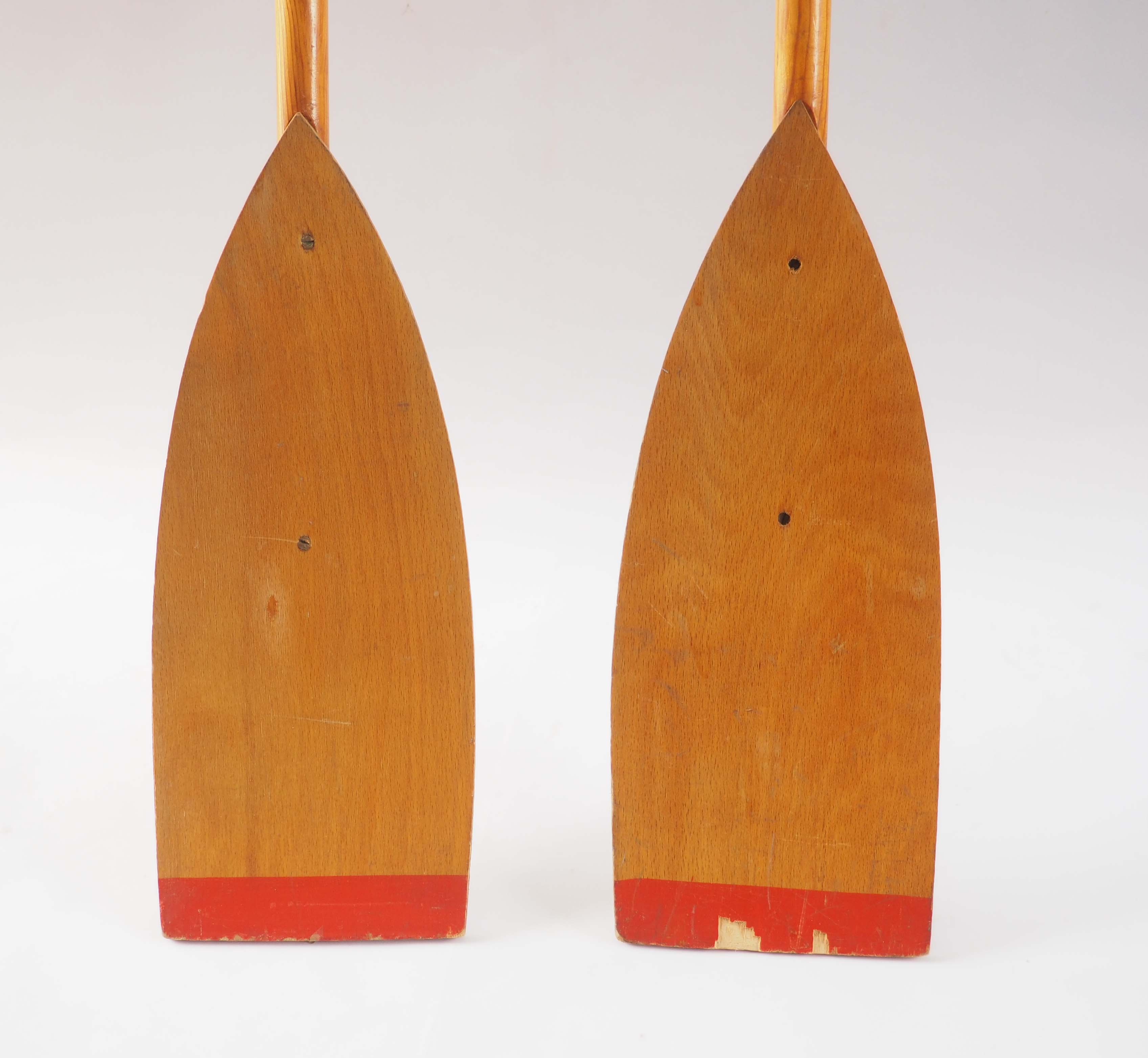 Pair of old wooden oars
