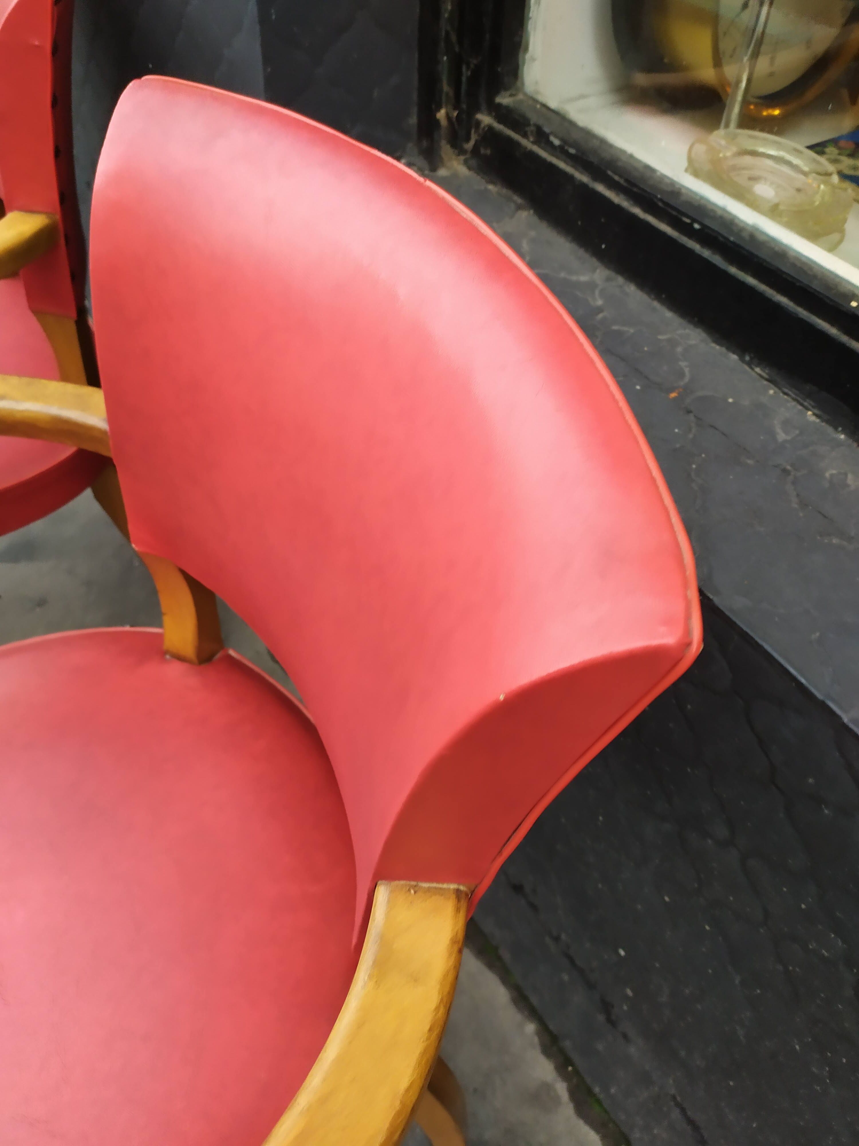 Pair of red vintage bridge armchairs