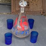 Peacock pattern liqueur decanter and 4 small vintage cobalt blue glasses