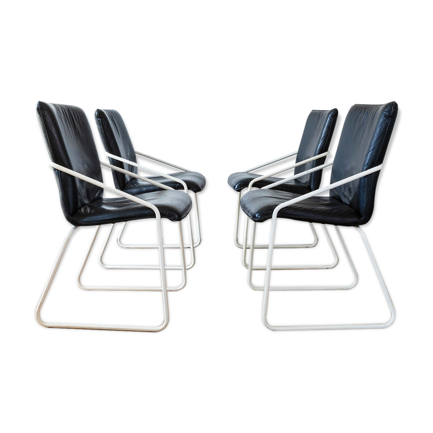Series of 4 leather chairs, white lace-up sled