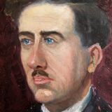 Old oil painting on cardboard portrait of a man in a dark suit