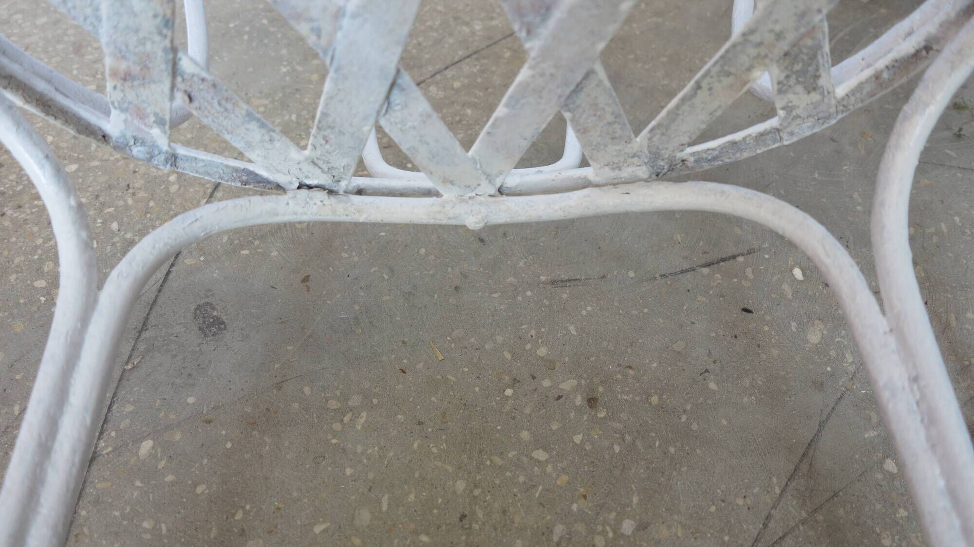 Pair of antique garden chairs, wrought iron, white paint.