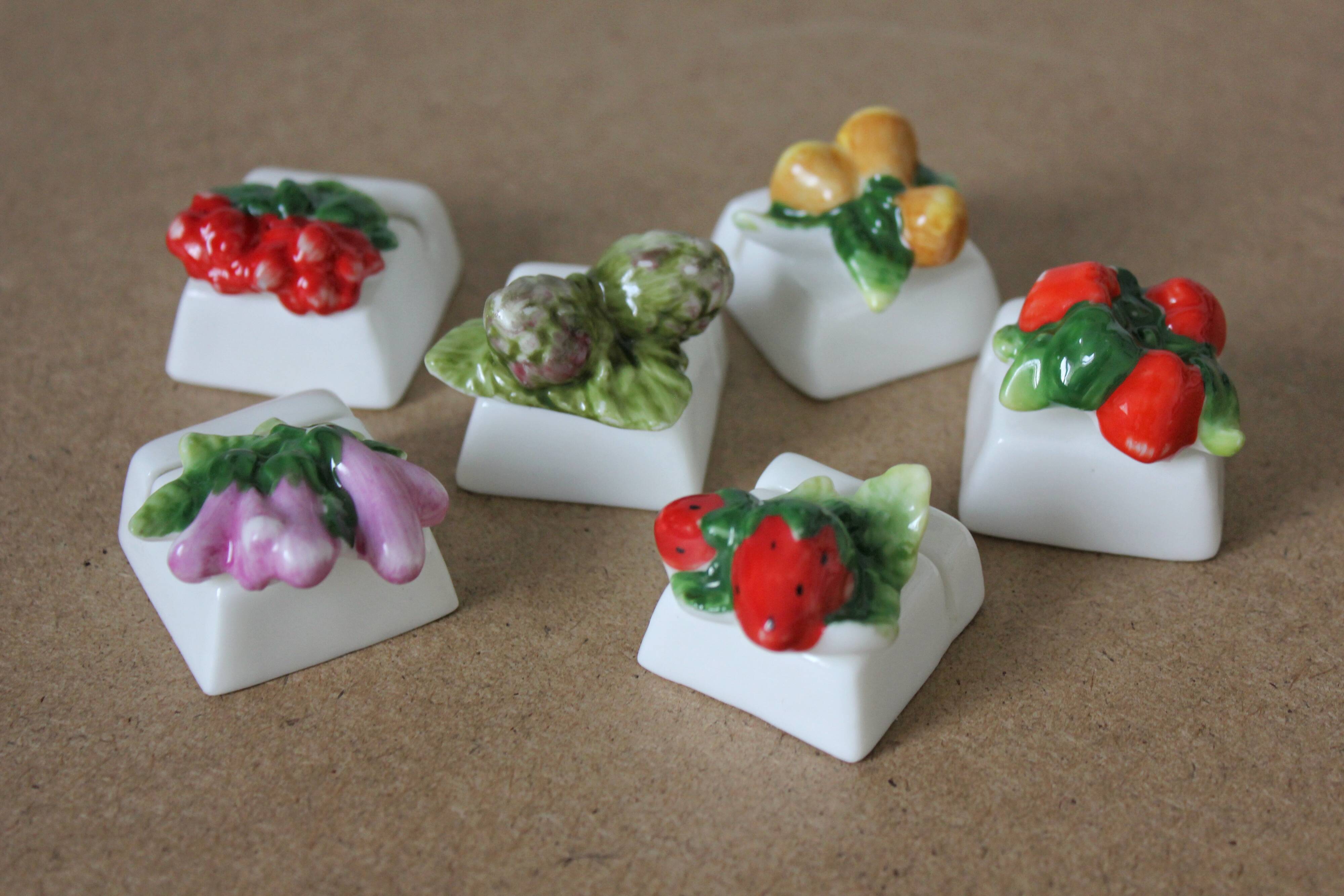 6 vintage fruit and vegetable-themed porcelain name tags in barbotine