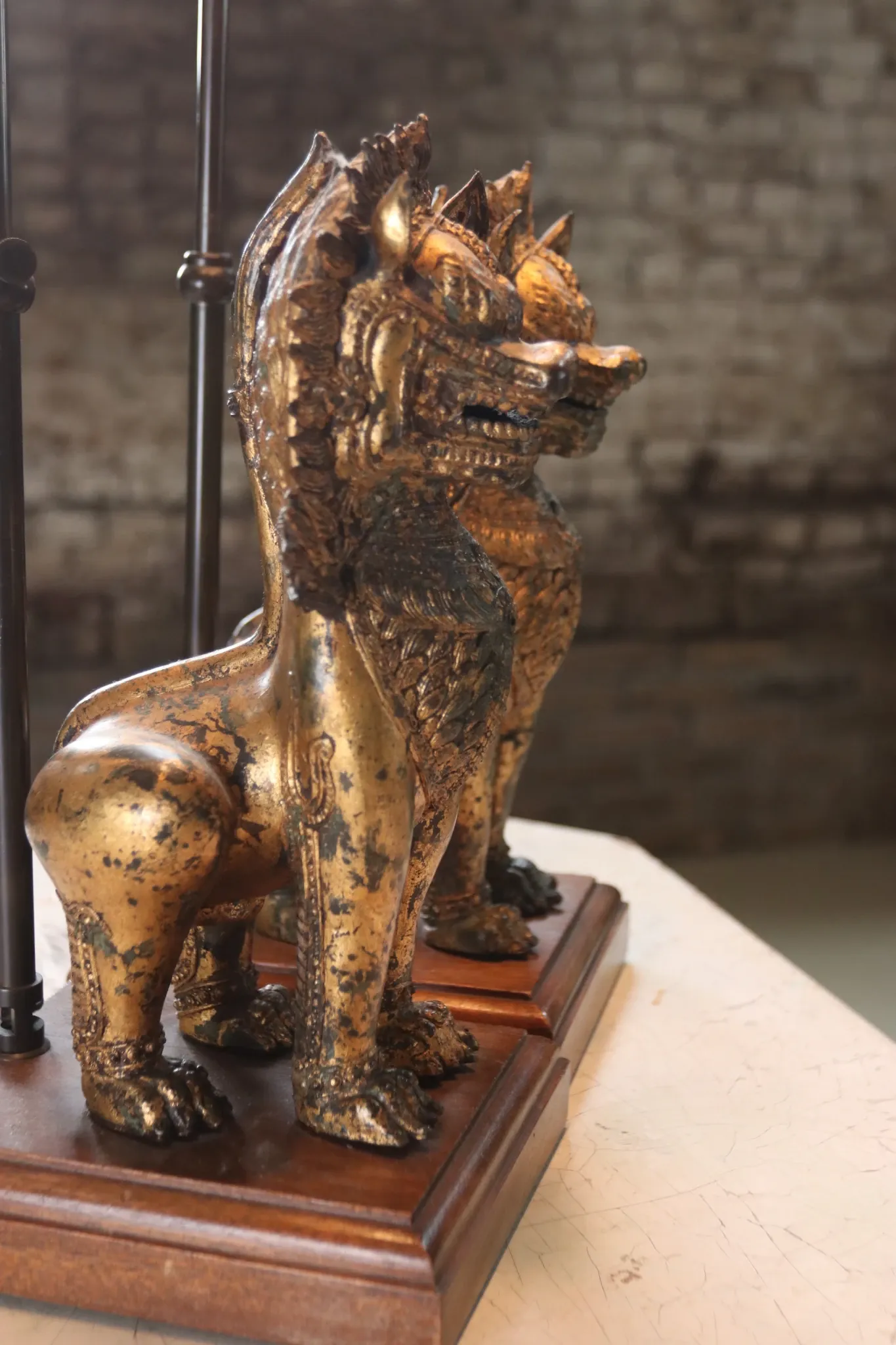 Pair of table lamps with gilt bronze Singha lions – Thailand, 1970s