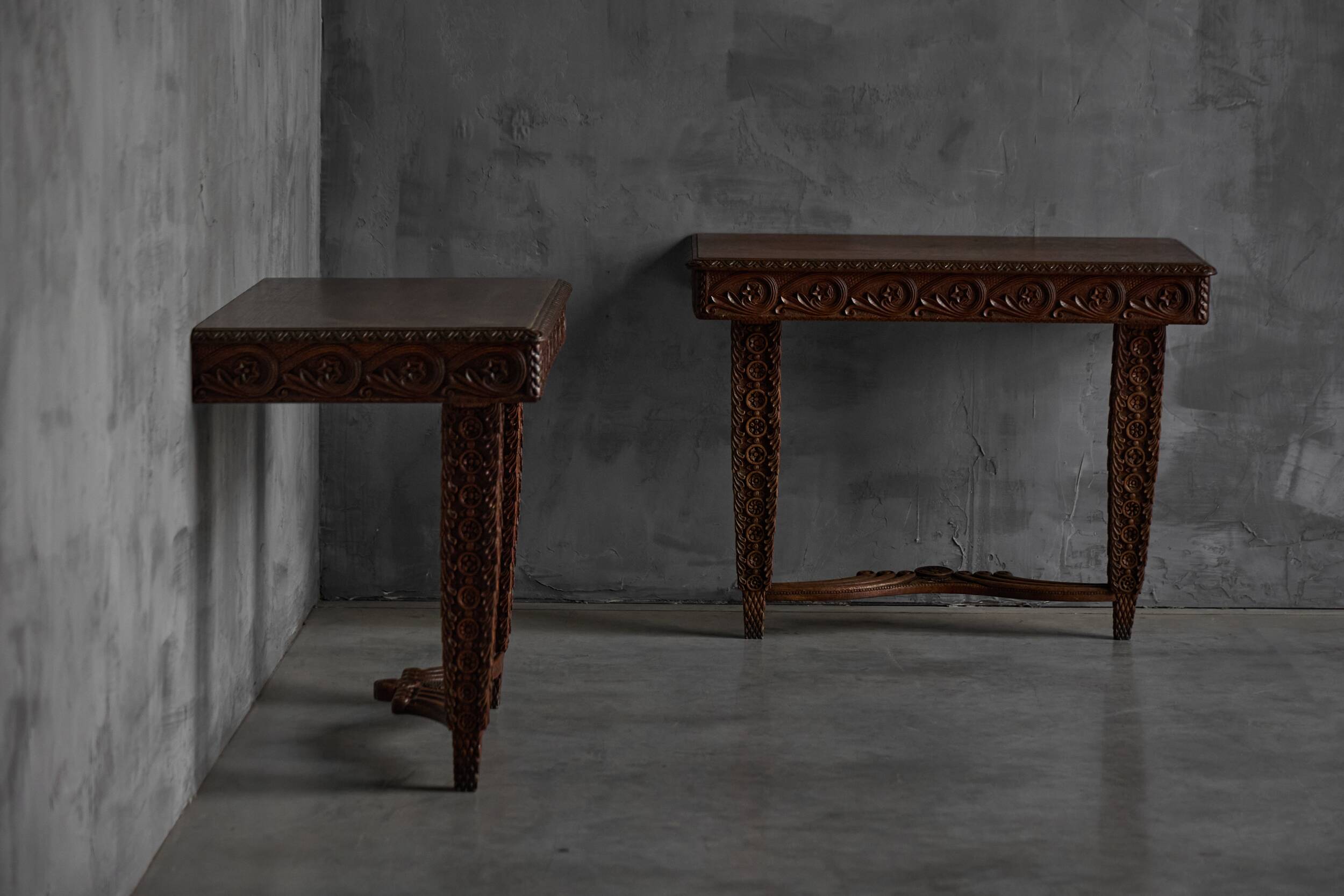 Hand-carved ornate wooden console tables, France, late 19th century