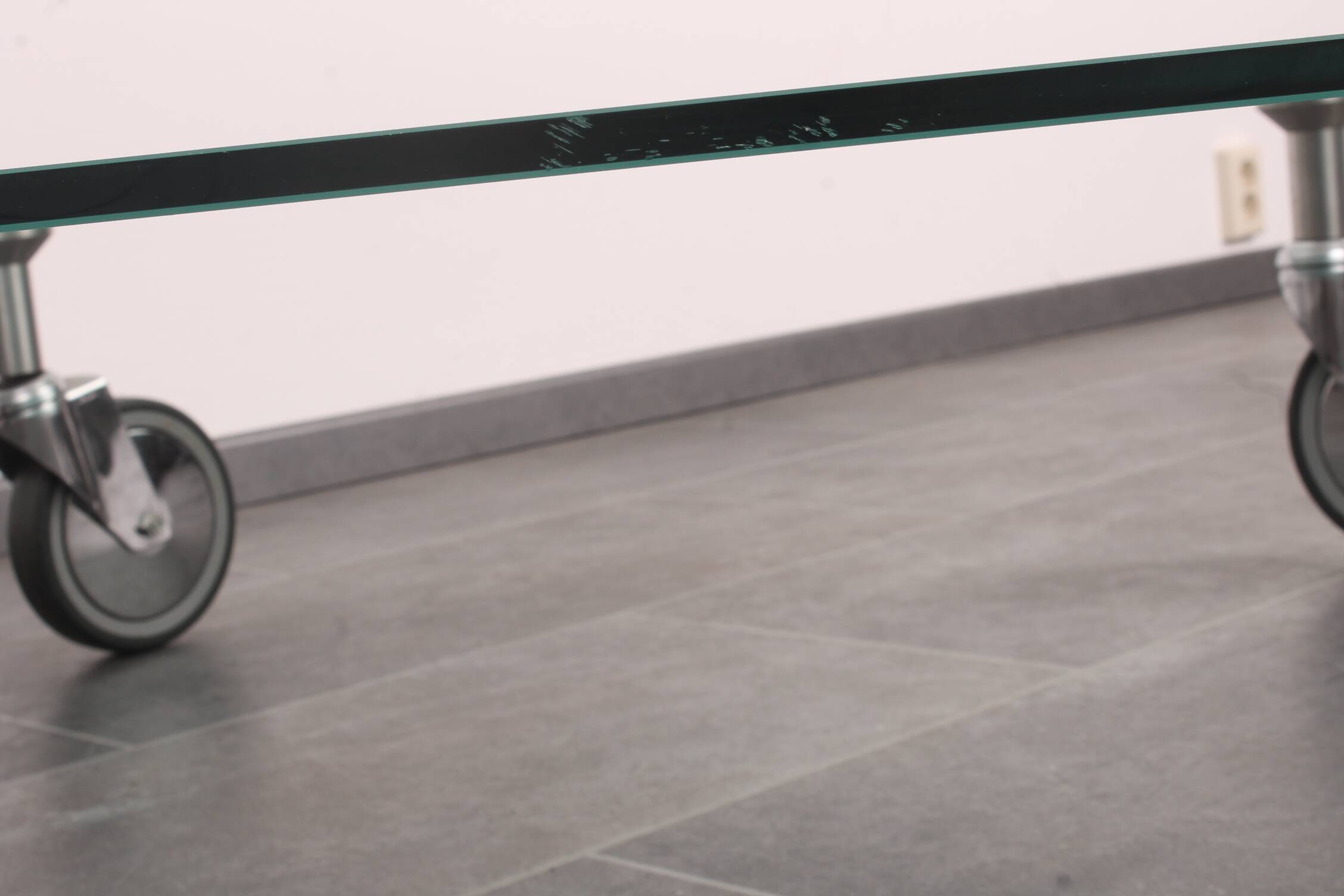 Wheeled glass coffee table