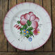 Old faience plate with wall support: blueberry decor