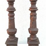 Pair of cast iron candlesticks