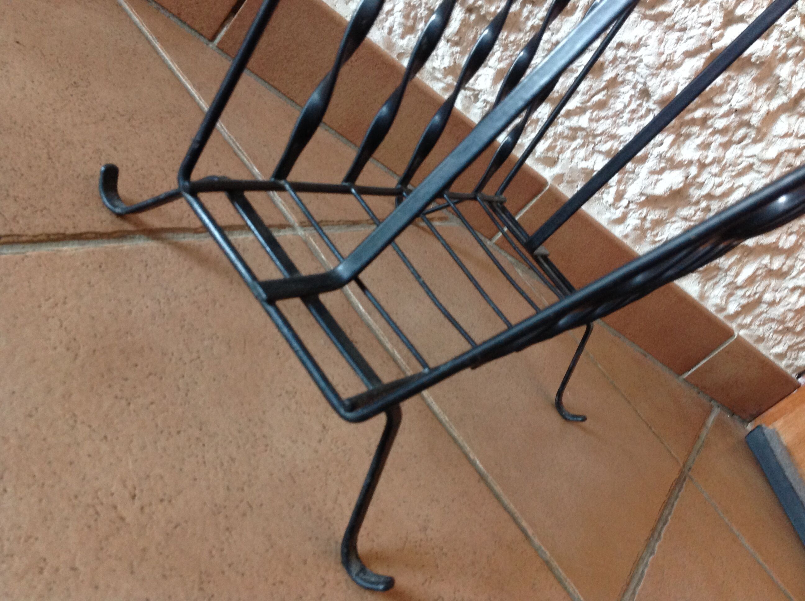 Black metal magazine holder