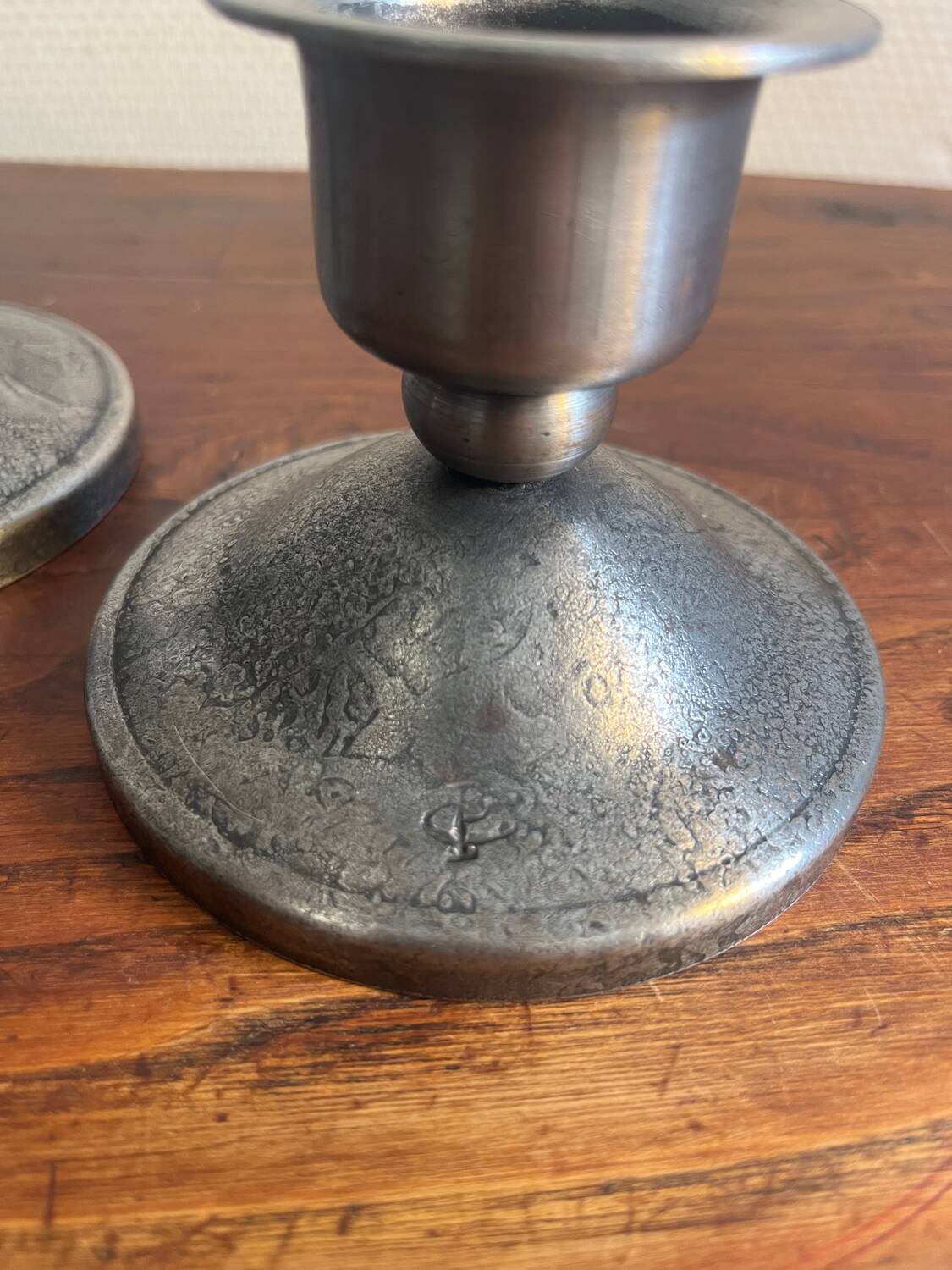 2 Charles Piguet wrought iron candlesticks