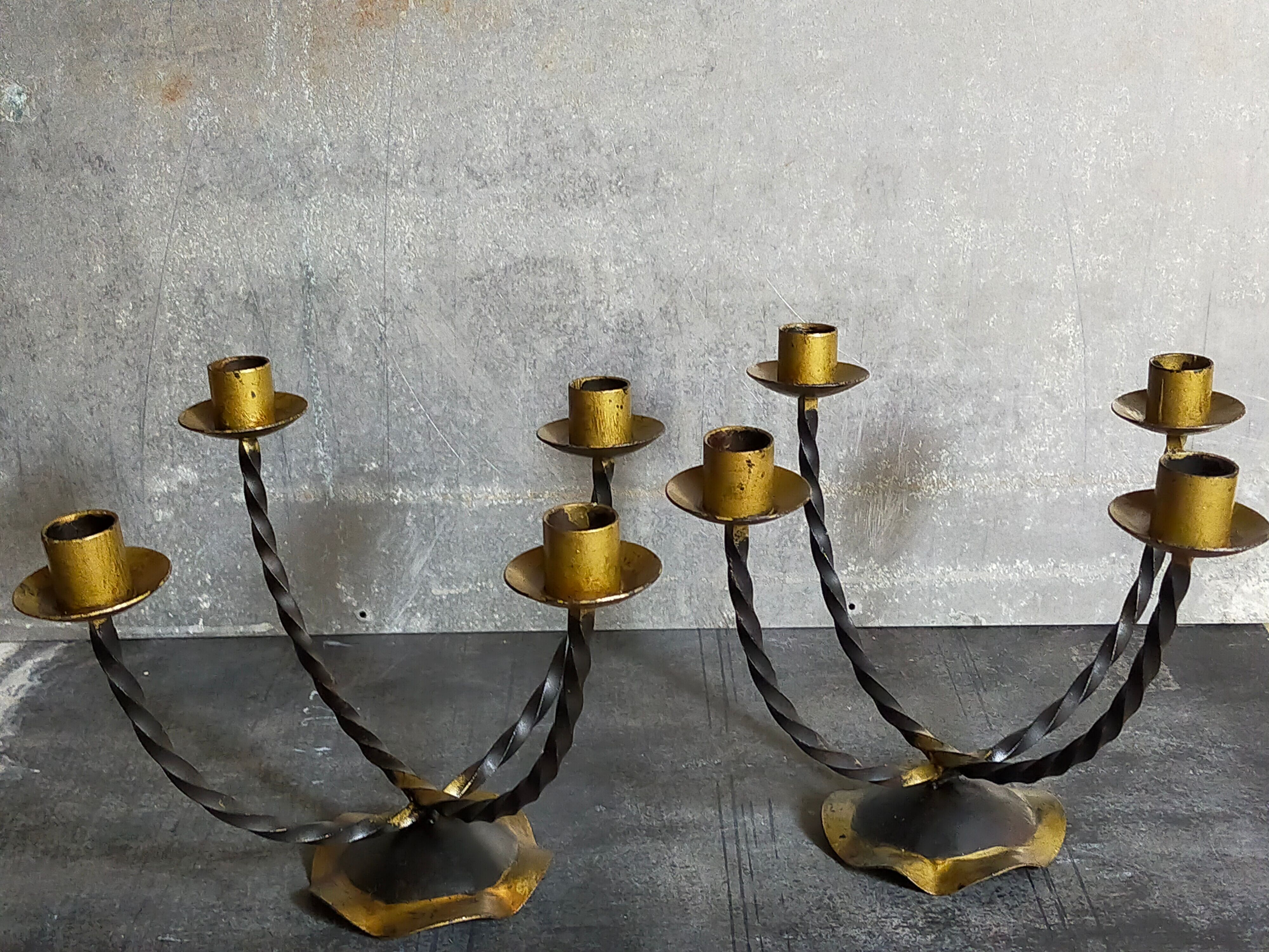 Pair of wrought iron candle holders four arms 50s