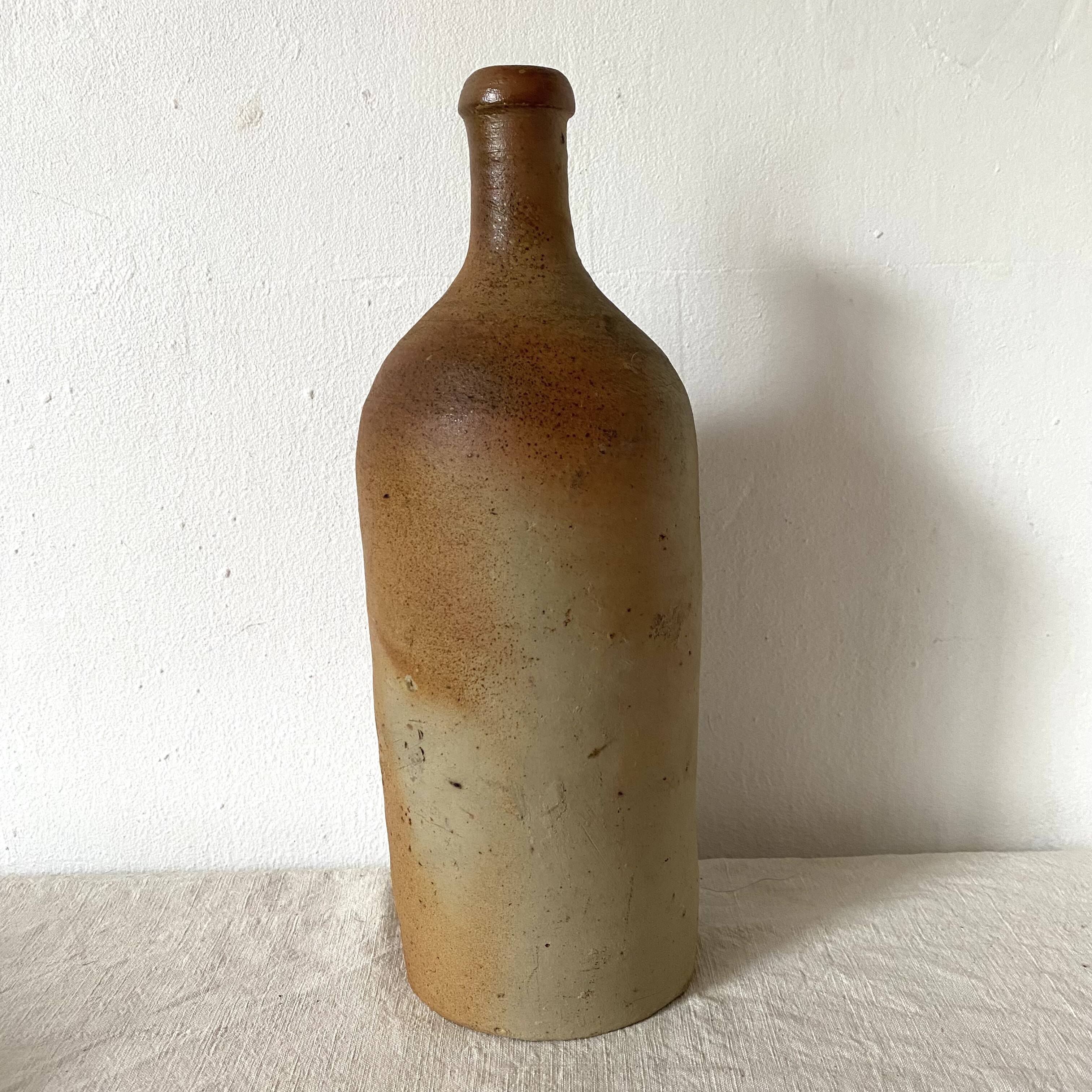 Old terracotta bottle