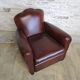 Club chair with floral backrest