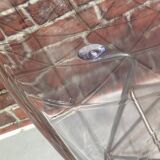 Suite of four plexiglass and metal chairs
