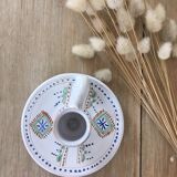 Green ceramic cellar rat candle holder