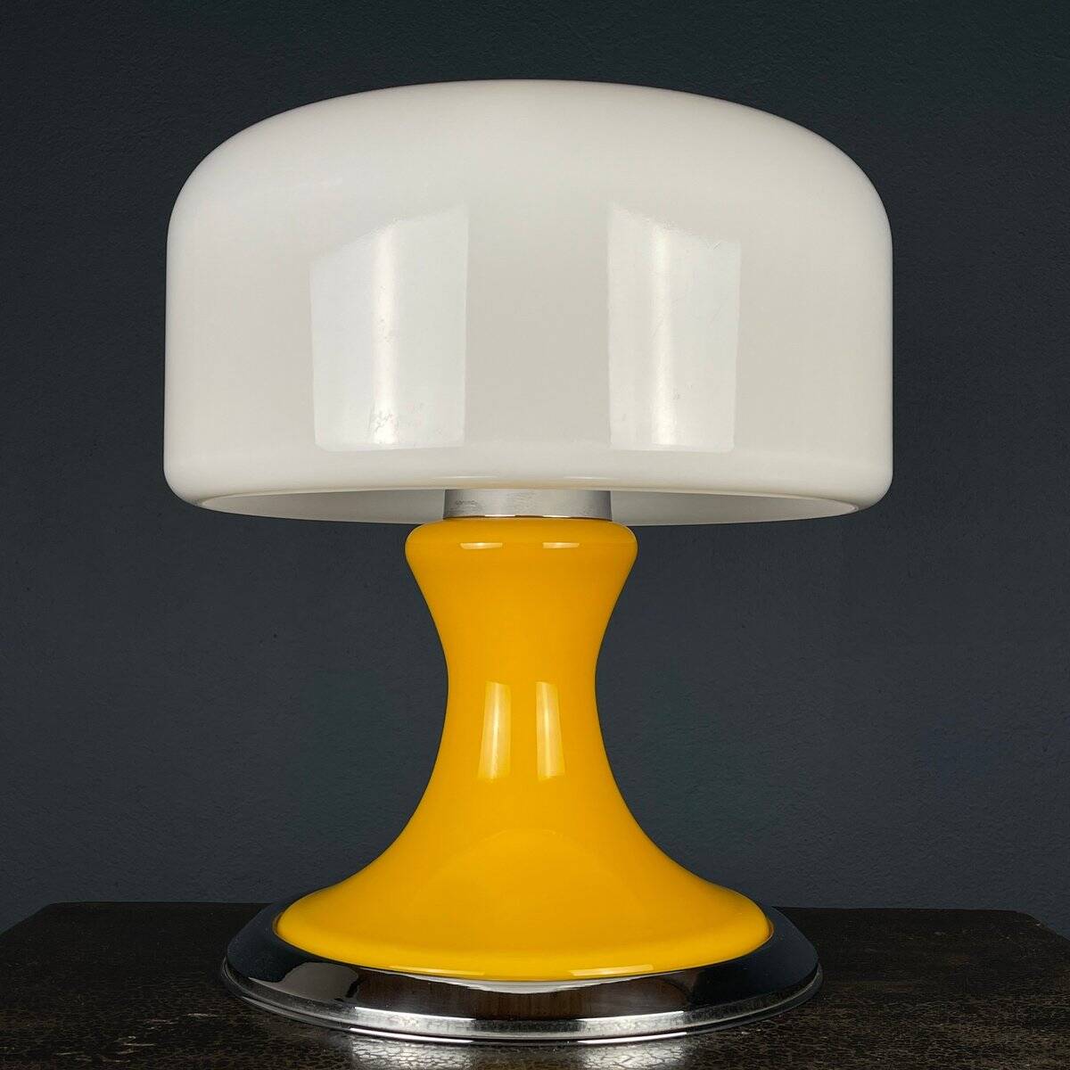 Mid-century Italian yellow table lamp from the 1970s.