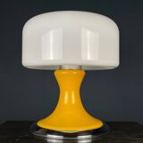 Mid-century Italian yellow table lamp from the 1970s.