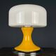 Mid-century Italian yellow table lamp from the 1970s.